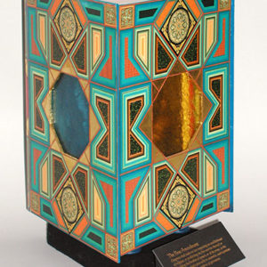 Colorful reliquary for the Ashes of Salman Rushdie's Satanic Verses