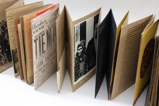 brown accordion fold book