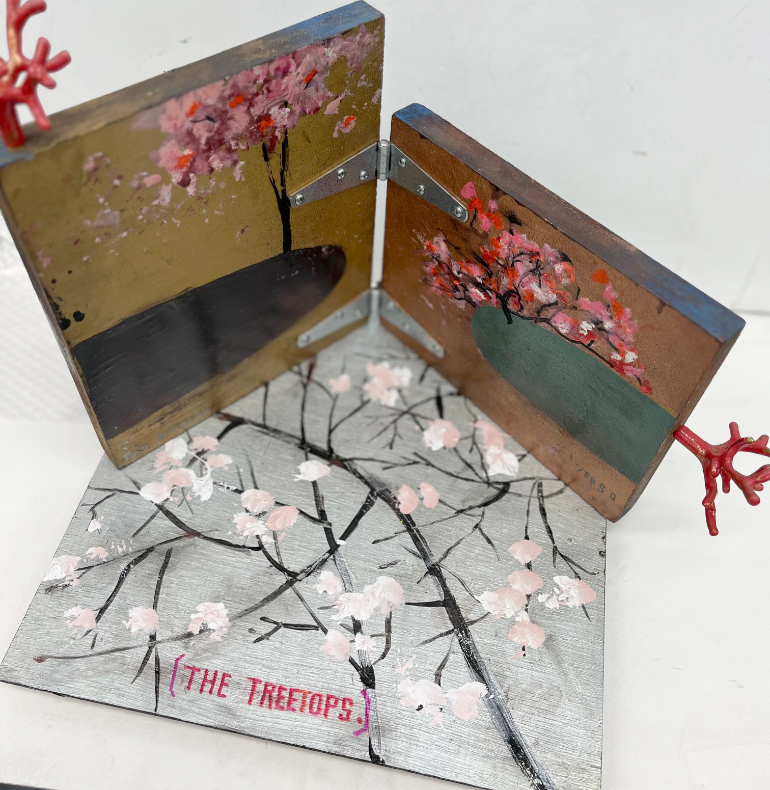 Artists' book with cherry blossom branch