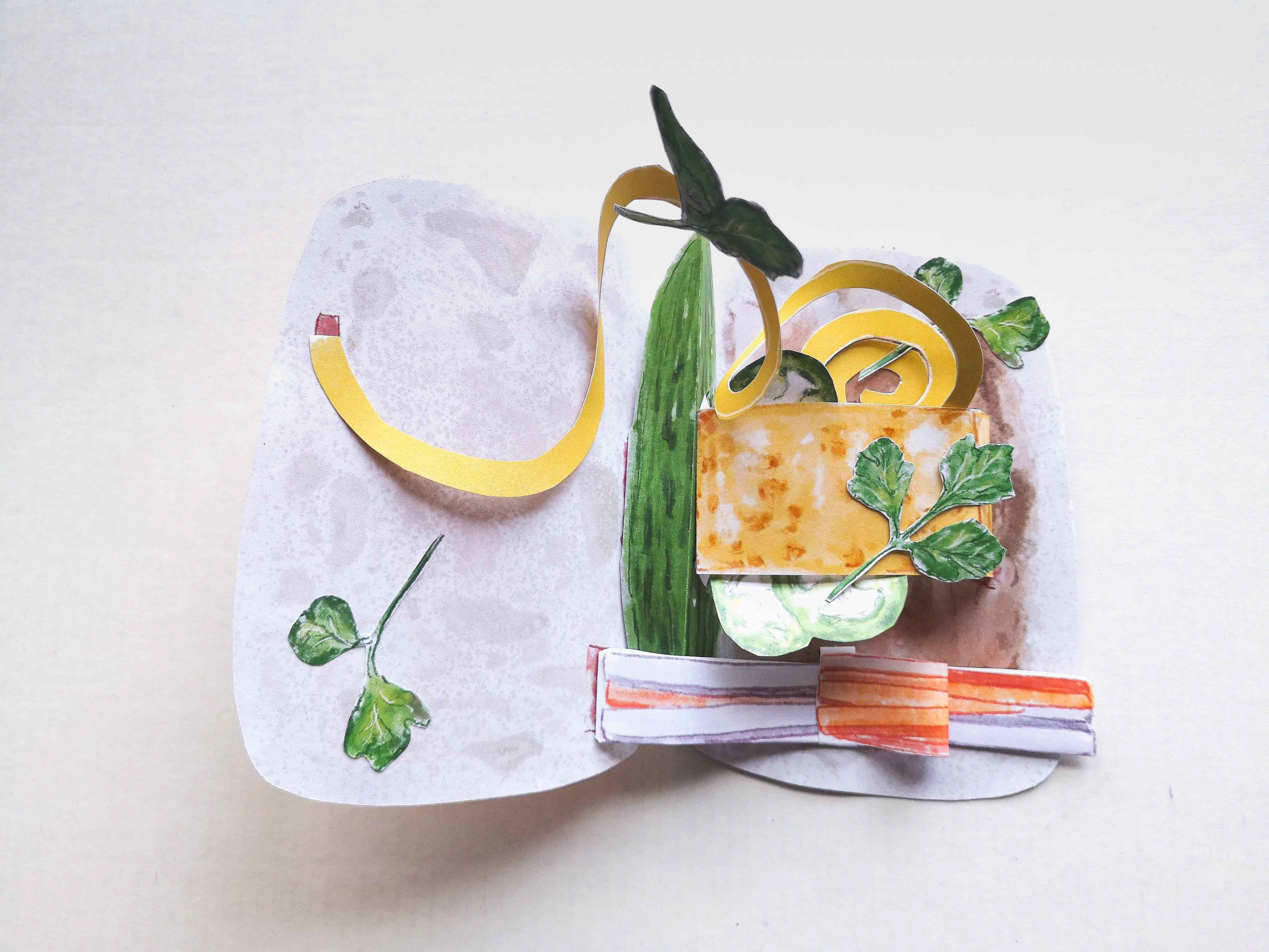 Pictured is a pop-up Bánh Mì made from colored cardstock.