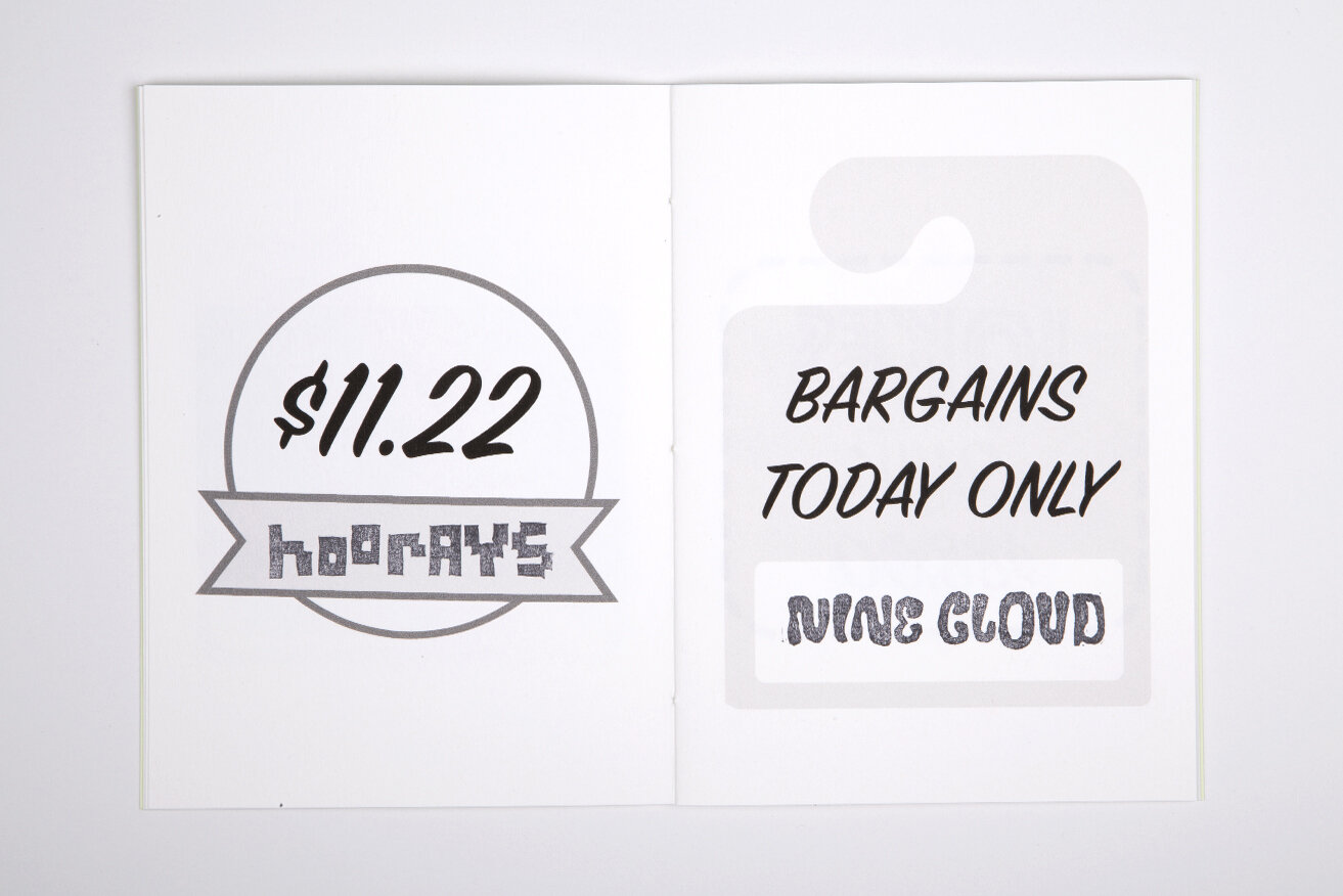 Open white book over white background. Left page shows a circle and with a ribbon on, containing the text "$11.22: Hoorays". The right page shows a stamped-like light-grey price-tag containing the words "Bargains today only: Nine Cloud" in caps.