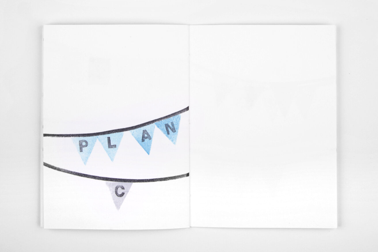 Open white book over white background. On the left page, there are two garlands containing the text "Plan C". The right page is blank.