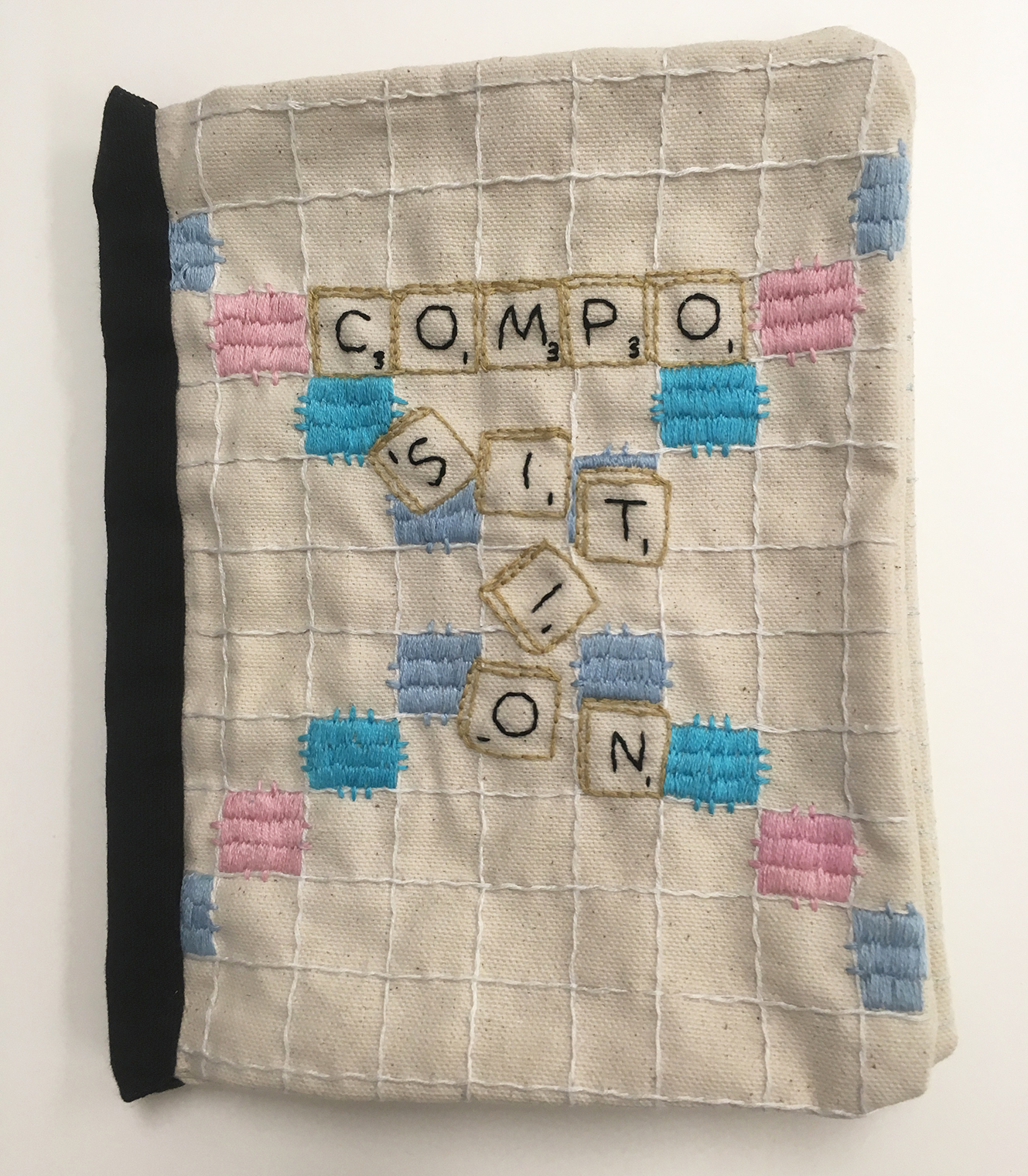 Embroidered composition notebook entitled "Common Threads" by Candace Hicks