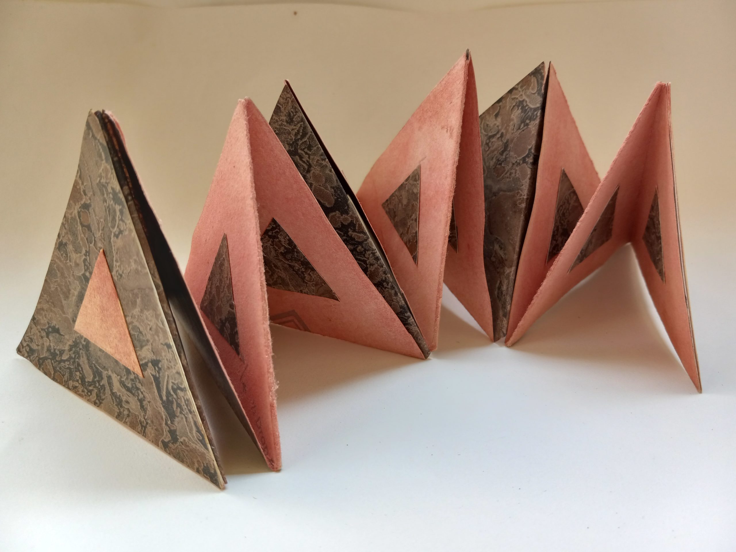 Accordion book in the shape of a triangle