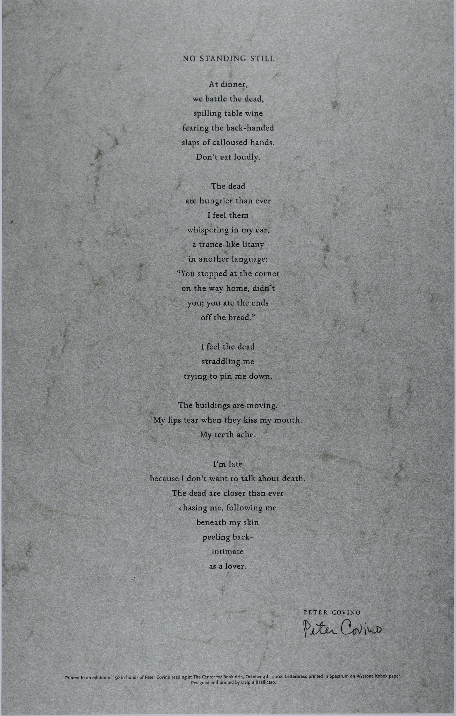 This broadside is long and vertically rectangular in size, with a stone gray color background. The title is located directly above, near the edge of, the broadside. The text and title are right in the middle of the paper and stretch down to the bottom of the page, both are black in color. The text is formatted into paragraphs, five in total.