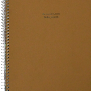 Brown paper soft cover book with metal spiral binding on the left